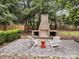 Brick fireplace with lounge area for relaxing outdoors at 914 S Main St, Summerville, SC 29483