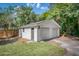 Detached two car garage with grass and asphalt driveway at 914 S Main St, Summerville, SC 29483