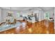 Spacious kitchen with white cabinets, stainless steel appliances, and island with seating at 914 S Main St, Summerville, SC 29483