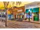 Inviting brick street with shops and eateries is adorned with festive decorations and warm lighting at 914 S Main St, Summerville, SC 29483