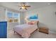 Comfortable bedroom featuring a ceiling fan, a window, and stylish bedding at 9700 Flooded Field Drive Dr, Ladson, SC 29456