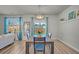 Comfortable dining room with stylish wooden table and accents at 9700 Flooded Field Drive Dr, Ladson, SC 29456