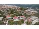 Stunning aerial view of historic downtown neighborhood, showcasing colorful homes and waterfront access at 10 Water St, Charleston, SC 29401