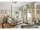 Comfortable bedroom featuring floral accents, and natural light at 10 Water St, Charleston, SC 29401