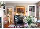 A cozy living room featuring hardwood floors, neutral colors, and a black leather chair at 10 Water St, Charleston, SC 29401