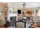 Inviting living room featuring a fireplace, hardwood floors, and abundant natural light at 10 Water St, Charleston, SC 29401