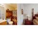 En-suite bathroom with colorful shower curtain, decorative cabinet, and natural lighting at 103 Haleswood Cir, Goose Creek, SC 29445