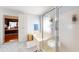Bright bathroom with a soaking tub, separate shower, and linen closet provides a luxurious space at 103 Haleswood Cir, Goose Creek, SC 29445