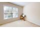 Bright bedroom features a window and neutral carpet, offering a comfortable atmosphere at 103 Haleswood Cir, Goose Creek, SC 29445