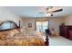 Bedroom features a ceiling fan, a large window, and patterned wallpaper at 103 Haleswood Cir, Goose Creek, SC 29445