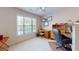 Comfortable bedroom with large windows and a dedicated workspace at 103 Haleswood Cir, Goose Creek, SC 29445