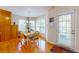 Bright breakfast nook with views, warm lighting, and an exterior door for easy outdoor access at 103 Haleswood Cir, Goose Creek, SC 29445