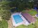 Aerial view of a pool and clubhouse surrounded by mature trees at 103 Haleswood Cir, Goose Creek, SC 29445