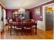 Formal dining room with a chandelier, a wooden table, and elegant decor at 103 Haleswood Cir, Goose Creek, SC 29445