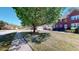 View of the front of the home with a well-maintained lawn and mature trees at 103 Haleswood Cir, Goose Creek, SC 29445