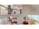 Bright interior view showcases an open floor plan, wooden railings, and neutral paint at 103 Haleswood Cir, Goose Creek, SC 29445