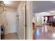 Mudroom with washer and dryer, white door to outside and coat rack at 103 Haleswood Cir, Goose Creek, SC 29445