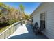 Spacious back deck great for outdoor gatherings with seating, grill, and a view of the yard at 104 Abrum Ct, Goose Creek, SC 29445