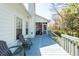 Inviting back deck with chairs and screen doors perfect for outdoor living at 104 Abrum Ct, Goose Creek, SC 29445