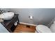 Powder room featuring a vessel sink, modern faucet, and wood flooring at 104 Abrum Ct, Goose Creek, SC 29445