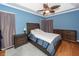 Cozy bedroom featuring blue walls, carpet, crown molding, and a ceiling fan at 104 Abrum Ct, Goose Creek, SC 29445