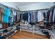 Walk-in closet with extensive shelving and hanging storage for clothes and shoes at 104 Abrum Ct, Goose Creek, SC 29445