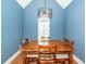 Dining room with a wooden table, four chairs, and an elegant chandelier at 104 Abrum Ct, Goose Creek, SC 29445