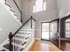 Two-story entryway features a staircase and front door entrance at 104 Abrum Ct, Goose Creek, SC 29445