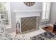 Detailed fireplace with white mantel and decorative screen at 104 Abrum Ct, Goose Creek, SC 29445
