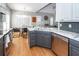 Modern kitchen with breakfast nook featuring marble countertops, stainless steel appliances, and gray cabinetry at 104 Abrum Ct, Goose Creek, SC 29445