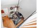 View from second floor to the living room, featuring a fireplace, ceiling fan, and comfortable seating area at 104 Abrum Ct, Goose Creek, SC 29445