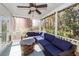 Inviting screened porch perfect for outdoor relaxation and entertaining with a fire pit at 104 Abrum Ct, Goose Creek, SC 29445