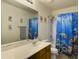 Bathroom with a sink, toilet, and a shower/tub with a colorful shower curtain at 104 Salem Rd, Ladson, SC 29456
