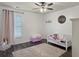 bedroom with wood floors and a white crib at 104 Salem Rd, Ladson, SC 29456