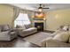 Inviting living room with a fireplace, hardwood floors, and comfortable seating arrangements at 104 Salem Rd, Ladson, SC 29456