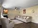 Spacious living room with hardwood floors, a fireplace, and ample seating for entertaining at 104 Salem Rd, Ladson, SC 29456
