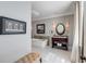 Elegant bathroom with a freestanding tub, stylish vanity, and modern lighting at 106 Murray Blvd, Charleston, SC 29401