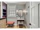 A bathroom features a vanity, a mirror, and a window at 106 Murray Blvd, Charleston, SC 29401