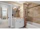 Bathroom featuring neutral tiling, a white vanity, and a shower with a curtain at 106 Murray Blvd, Charleston, SC 29401