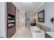 A spacious bathroom features a soaking tub, a walk-in shower, and gray walls at 106 Murray Blvd, Charleston, SC 29401
