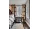 A bedroom features a desk, shutters, and curtains at 106 Murray Blvd, Charleston, SC 29401