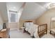 Cozy bedroom featuring a traditional bed frame and bright window with natural light at 106 Murray Blvd, Charleston, SC 29401