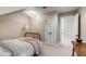 Inviting bedroom with neutral walls, white trim and doors and a traditional bed frame at 106 Murray Blvd, Charleston, SC 29401