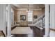 Bright foyer with dark hardwood floors, white trim, and stylish decorative accents at 106 Murray Blvd, Charleston, SC 29401