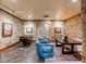 Basement game room featuring exposed brick, foosball table, and a desk at 106 Murray Blvd, Charleston, SC 29401