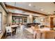 Open living space featuring wood beams, brick accents, and stylish seating at 106 Murray Blvd, Charleston, SC 29401