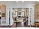 Elegant living room with fireplace, detailed trim, and comfortable seating arrangement at 106 Murray Blvd, Charleston, SC 29401