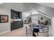 Spacious living room with a bar area, comfortable seating, and sliding doors to a balcony at 106 Murray Blvd, Charleston, SC 29401