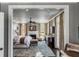 Spacious main bedroom with a fireplace, ceiling fan, and comfortable seating area at 106 Murray Blvd, Charleston, SC 29401