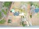 Aerial view of home with pool and long drive, surrounded by private, fenced-in grounds at 1158 Wildgame Rd, Summerville, SC 29486